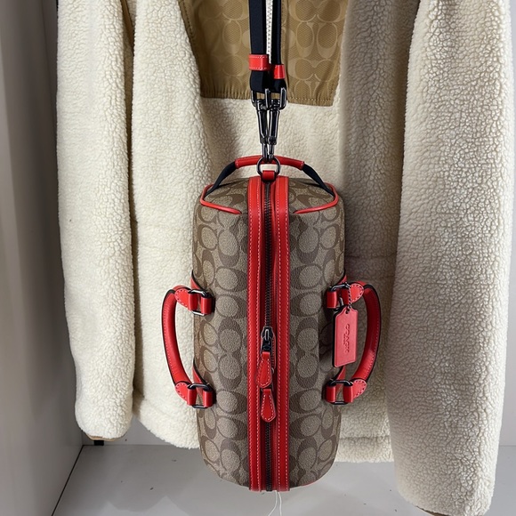 Coach men's Venturer Crossbody 27 In Colorblock Signature Canvas
QB/Khaki/Miami - Picture 15 of 16